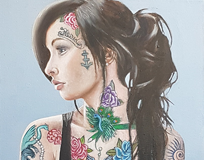 Girl with colourful tattoos.