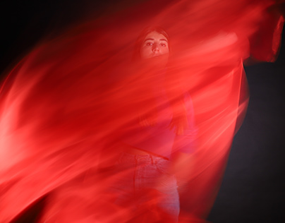 "Lady in Red" Slow shutter speed photo