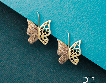 Industrial photography of butterfly design earrings