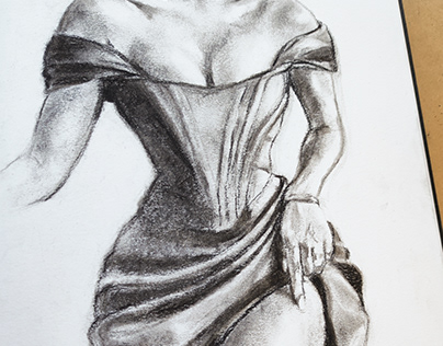 Dress charcoal drawing on Fabriano sketchbook