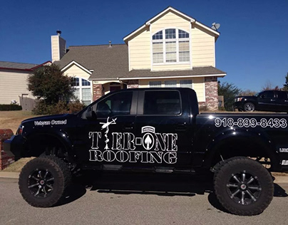 tier one roofing car wrap