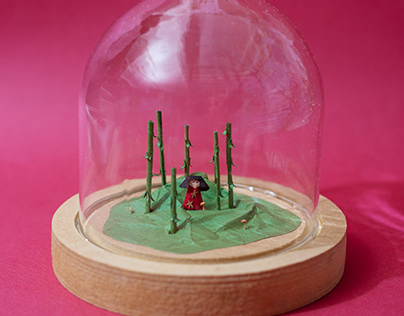 Tiny girl in a bamboo forest diorama