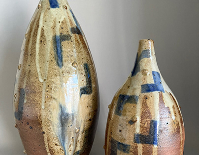 A pair of wood fired bottle-vases