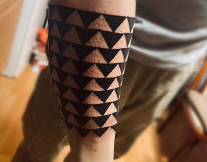 Tribal tattoo triangle