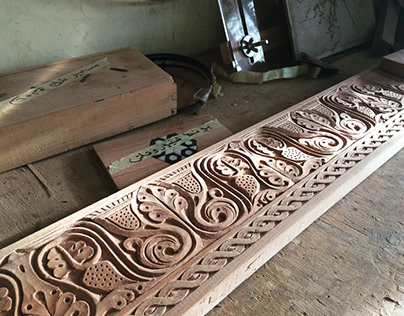 Wood carved loveseat