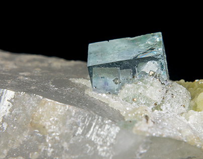 Pyrite Cubes in Fluorite on Quartz