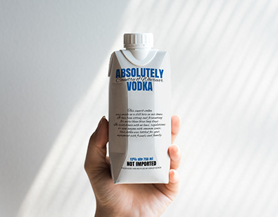 Free mockup PSD hand holding paper packaging bottle