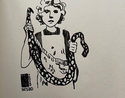 A young boy with a snake