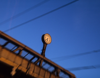 Railway clock and evening light