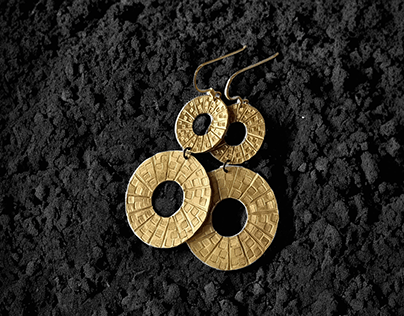 Interstellar earrings-chiselled bronze -gilded