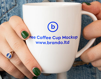Coffee Cup In Hand Free Mockup PSD by Brando.ltd