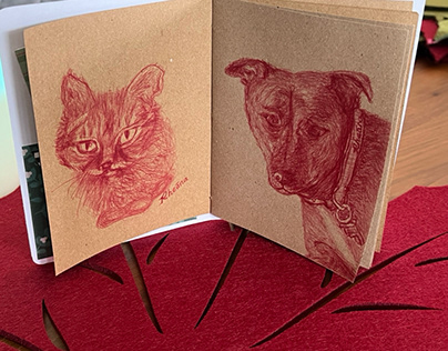 Project thumbnail - Beamer & Dixie in red ink on parchment