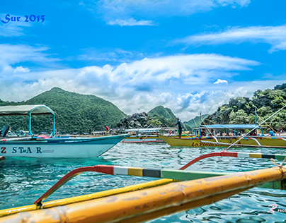 Boats and Scenic Mountains in Camsur, Philippines