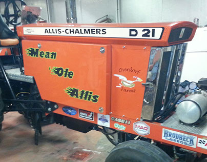Mean 'Ole Allis pulling tractor logo