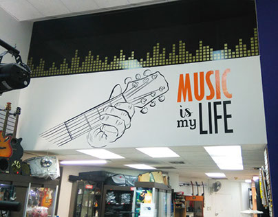 Decoración pared - tienda de música CERVANTES