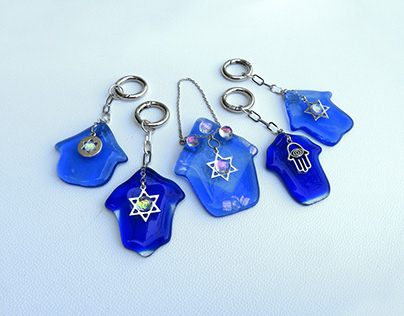 Blue glass keychains with Star of David or Hamsa