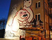 Swanski & Flying Fortress, painting a wall in Warsaw.