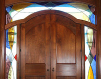 Black Walnut Entranceway With Stained Glass Surrounding