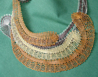 Necklaces in bobbin lace