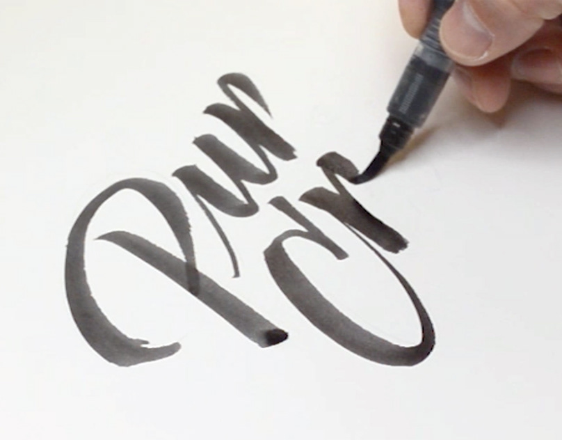 Logo design with custom lettering/calligraphy